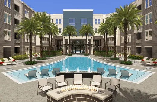 Residential courtyard rendering with a swimming pool, seating, and palm trees